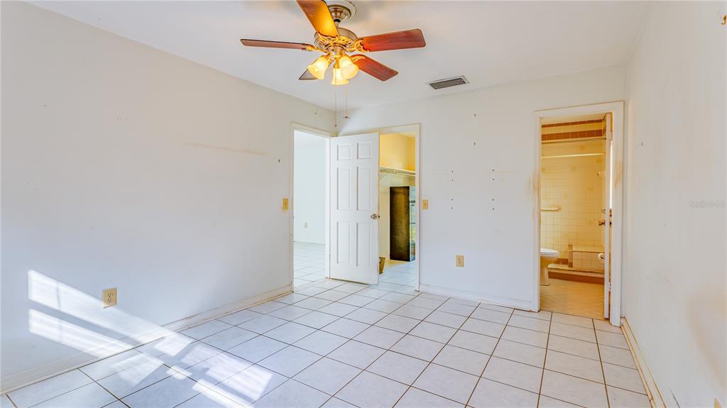 633 Huntington Street Brandon, FL 33511 - Photo 12 of 35 a view of an entryway with a chandelier fan