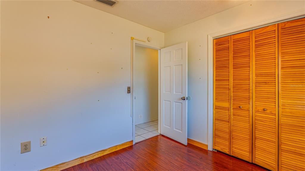 633 Huntington Street Brandon, FL 33511 - Photo 22 of 35 a view of empty room with wooden floor