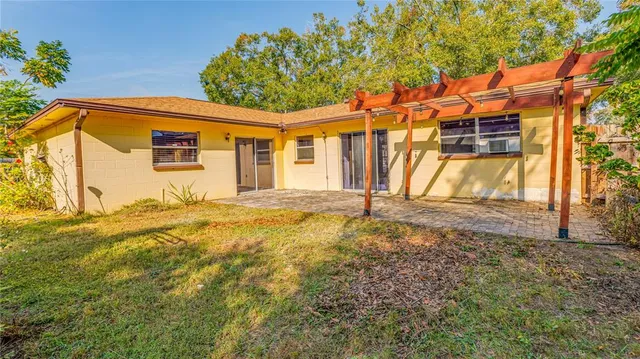 a view of a backyard with a small cabin