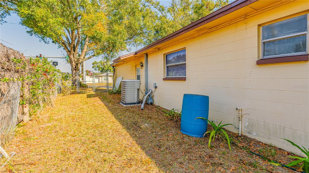 633 Huntington Street Brandon, FL 33511 - Photo 32 of 35 a view of a brick house with many windows