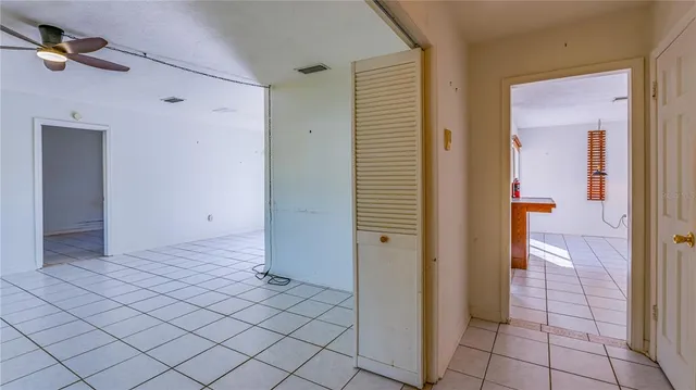 a view of an empty room and window