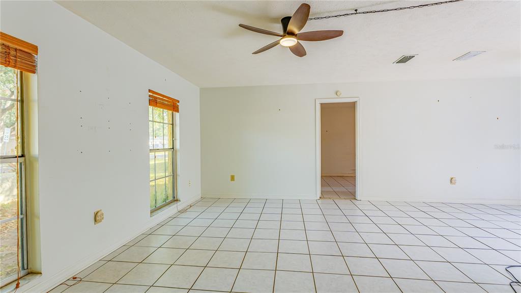 633 Huntington Street Brandon, FL 33511 - Photo 6 of 35 a view of an empty room and window