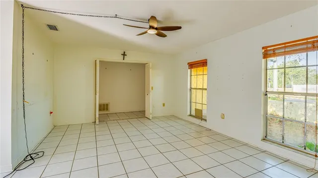 a view of an empty room and window