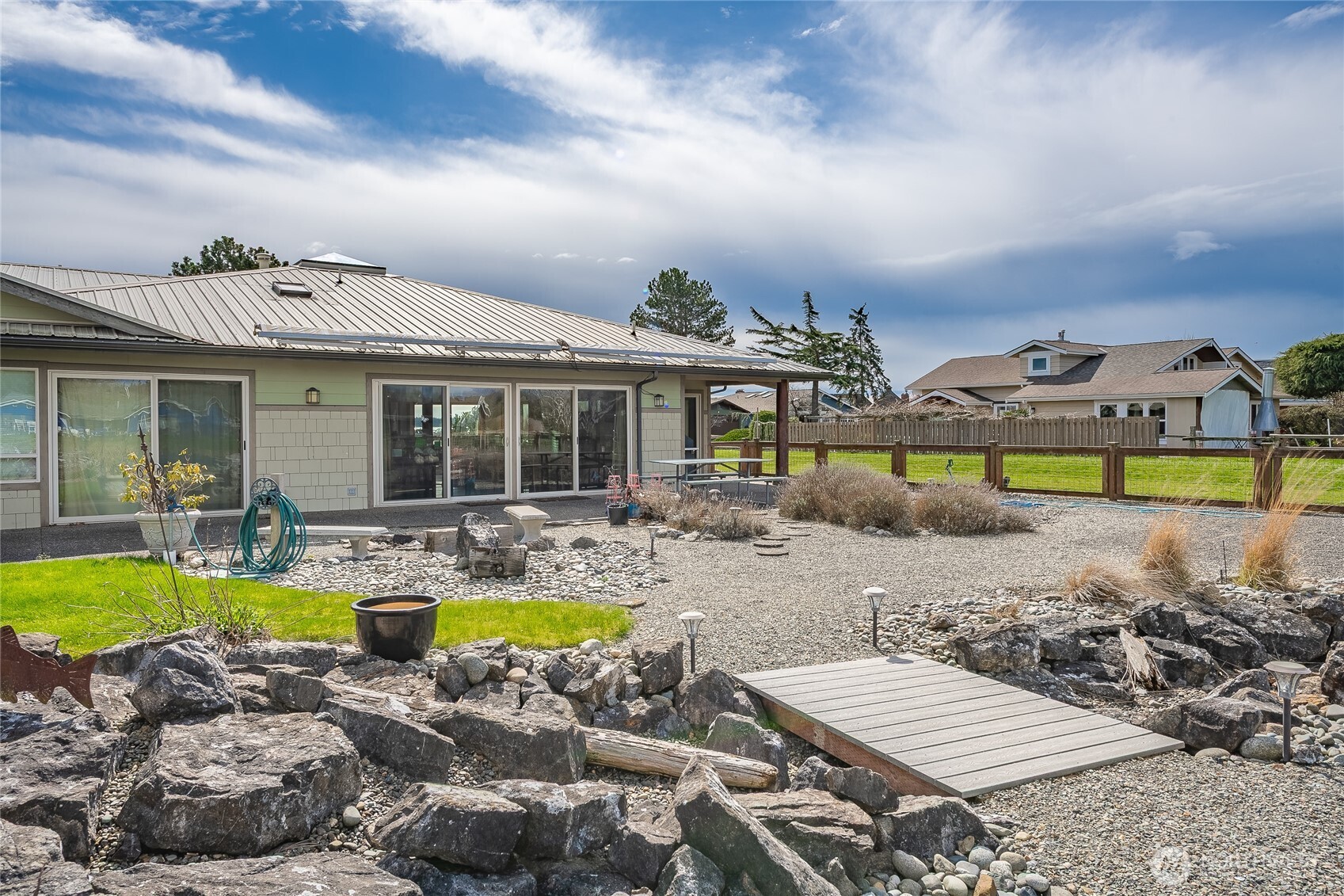 5382 Nootka Loop Birch Bay, WA 98230 - Photo 12 of 40 a view of a house with swimming pool and chairs