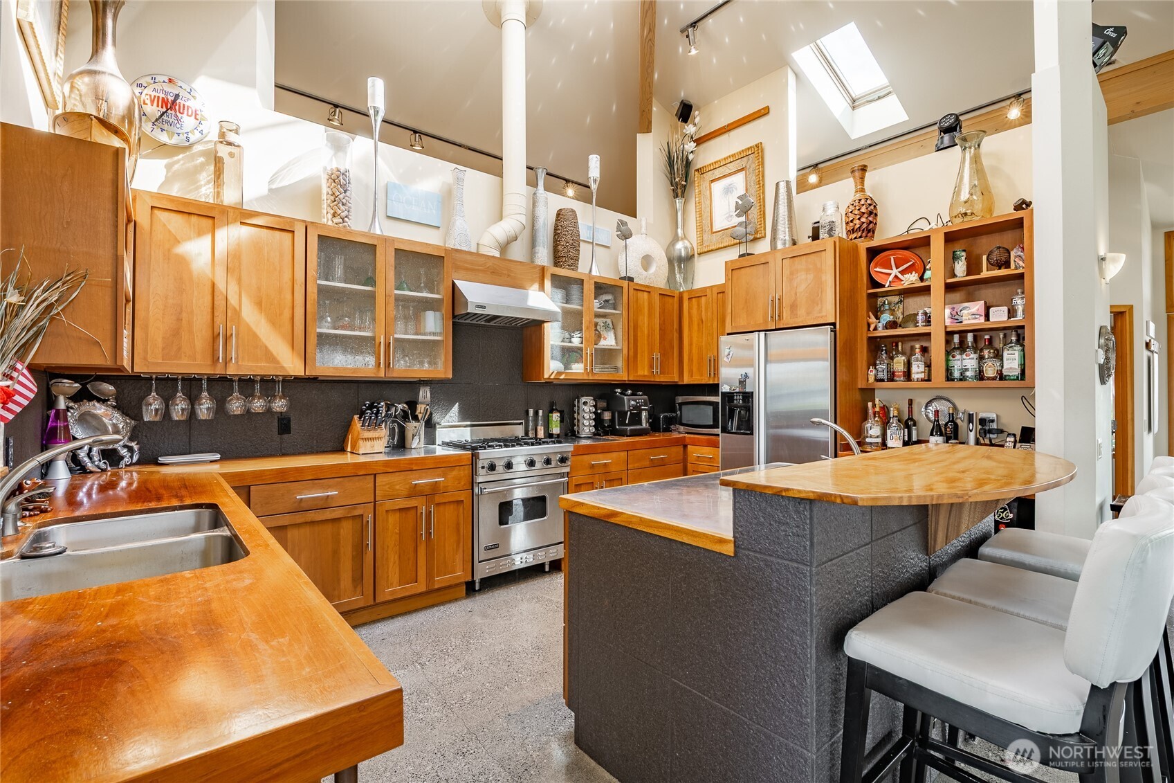 5382 Nootka Loop Birch Bay, WA 98230 - Photo 16 of 40 a view of a kitchen with a table and chairs