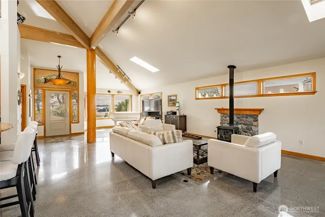 a living room with furniture and a table