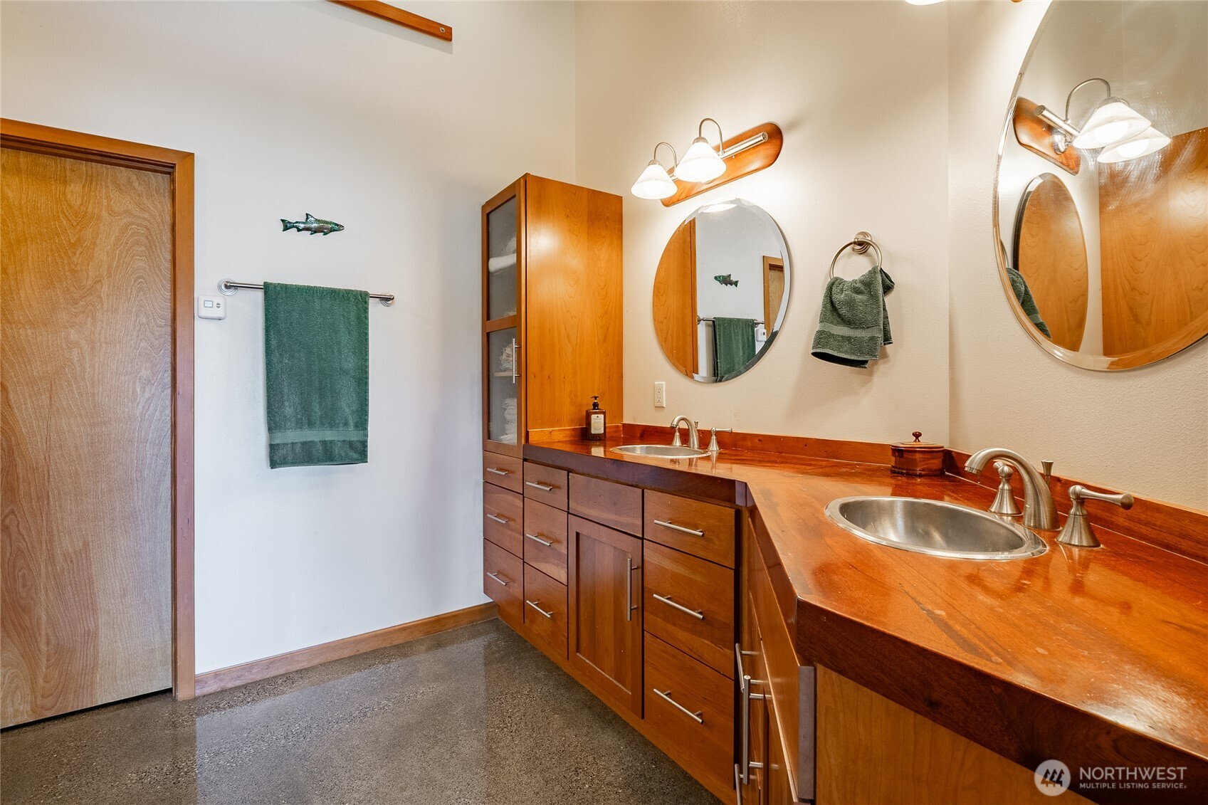 5382 Nootka Loop Birch Bay, WA 98230 - Photo 30 of 40 a bathroom with a sink and a mirror