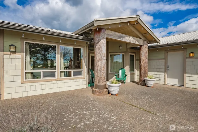 a view of a house with outdoor space and porch