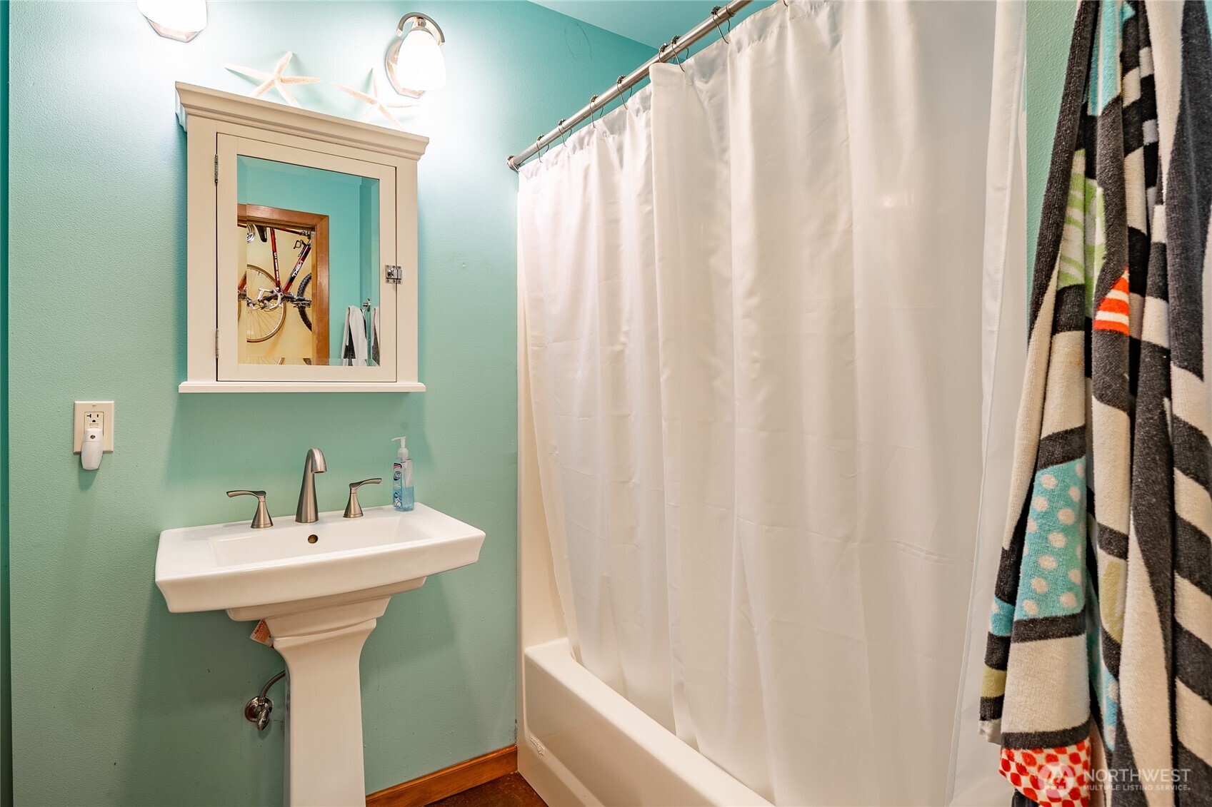 5382 Nootka Loop Birch Bay, WA 98230 - Photo 36 of 40 a bathroom with a sink and a mirror