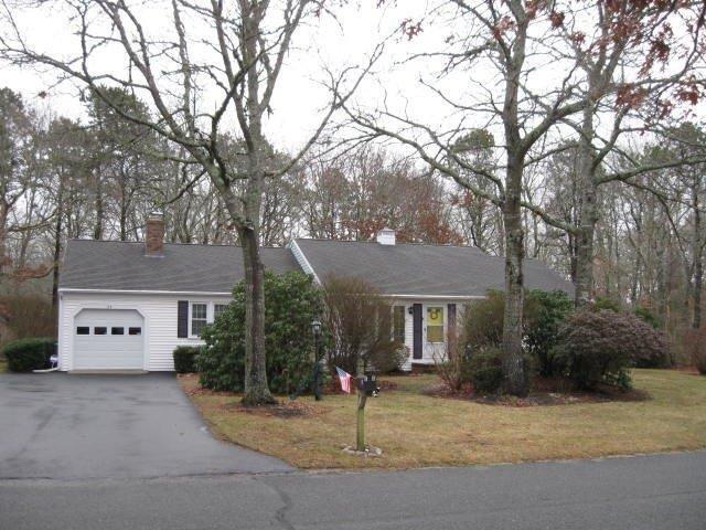 64 Ansel Howland Road Centerville, MA 02632 - Photo 1 of 31 a house view with a outdoor space