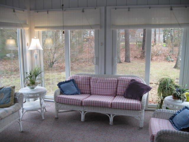64 Ansel Howland Road Centerville, MA 02632 - Photo 17 of 31 a living room with furniture and a large window