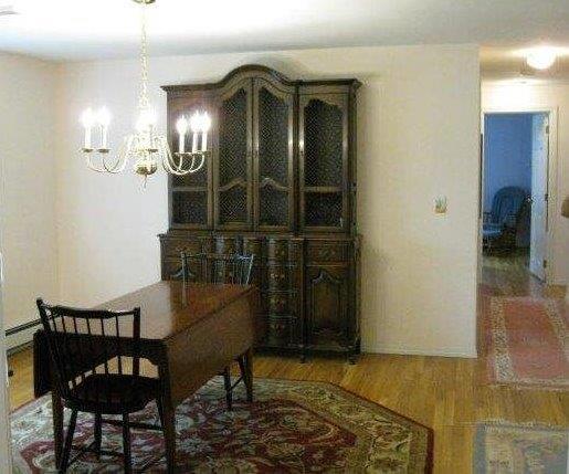 64 Ansel Howland Road Centerville, MA 02632 - Photo 23 of 31 a view of a livingroom with furniture and chandelier