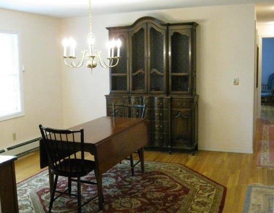 64 Ansel Howland Road Centerville, MA 02632 - Photo 24 of 31 a view of a room with a table and chairs