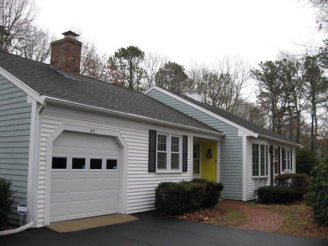 64 Ansel Howland Road Centerville, MA 02632 - Photo 31 of 31 a front view of a house with a yard