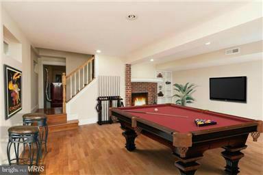 700 Midland Road Silver Spring, MD 20904 - Photo 15 of 17 a living room with furniture pool table flat screen tv and windows