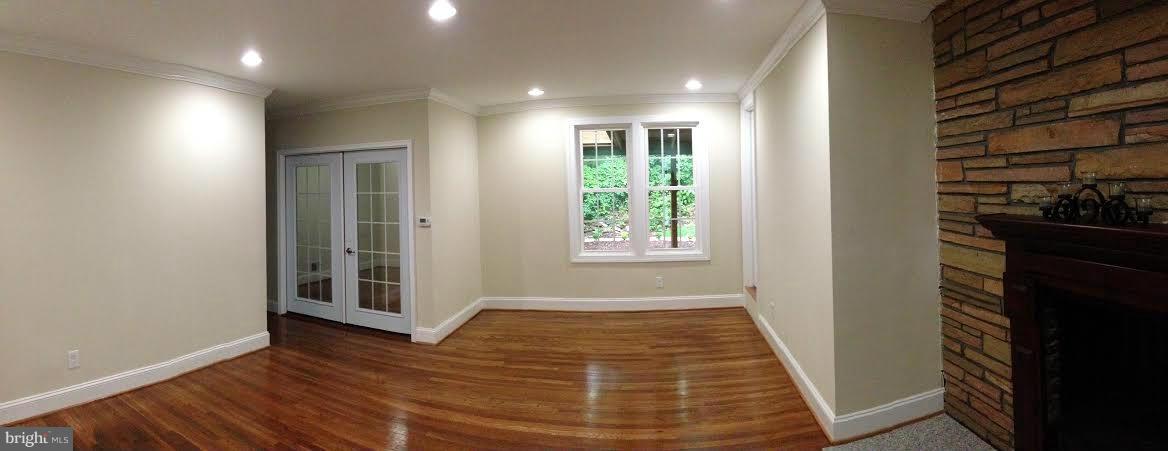 700 Midland Road Silver Spring, MD 20904 - Photo 3 of 17 wooden floor in an empty room with a window