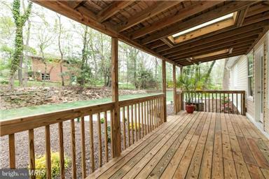 700 Midland Road Silver Spring, MD 20904 - Photo 4 of 17 a view of porch with wooden floor