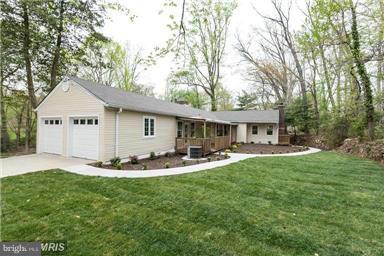 700 Midland Road Silver Spring, MD 20904 - Photo 7 of 17 a front view of house with yard outdoor seating and green space