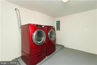 700 Midland Road Silver Spring, MD 20904 - Photo 8 of 17 a utility room with dryer and washer