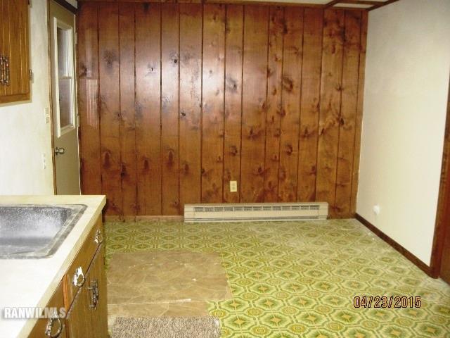 795 North Mammoser Road Stockton, IL 61085 - Photo 11 of 16 a bathroom with a granite countertop sink and a bathtub