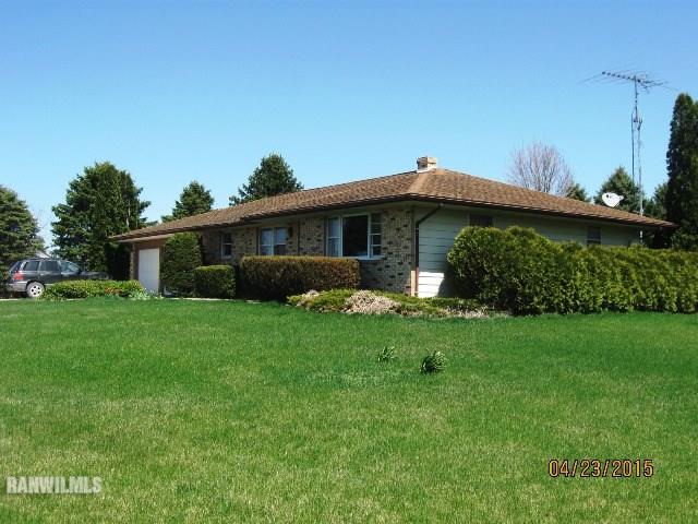 795 North Mammoser Road Stockton, IL 61085 - Photo 16 of 16 a front view of a house with a garden