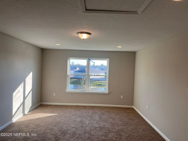 an empty room with windows