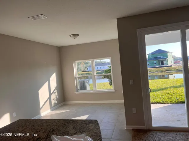 a living room with a large window