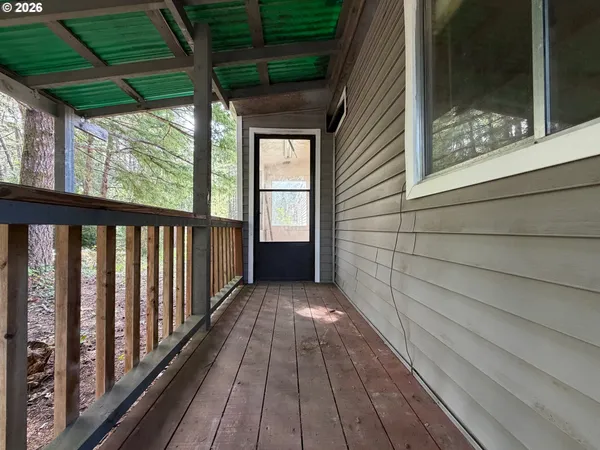 a view of a porch with seating space
