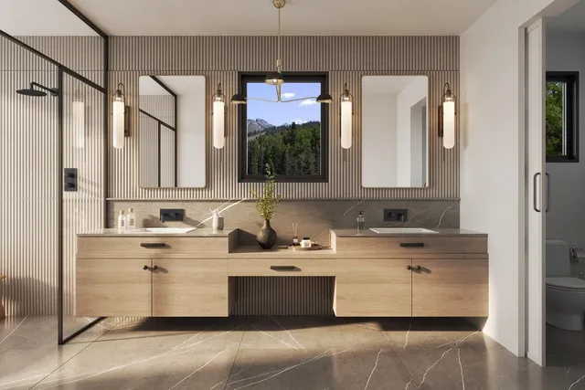 a bathroom with a double vanity sink mirror and bathtub