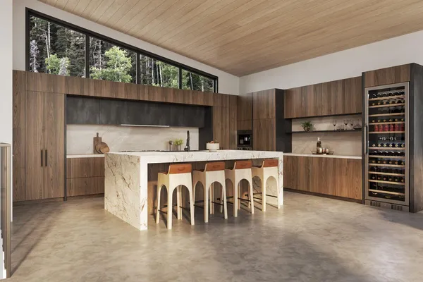 a kitchen with a table chairs sink and cabinets