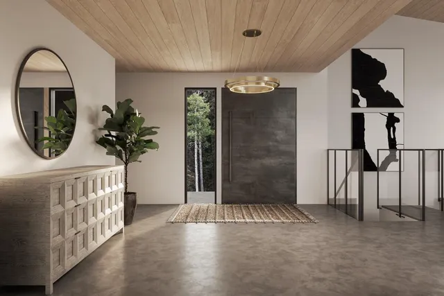 a view of entryway with a front door and wooden floor