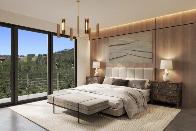 a bedroom with a bed a lamp and window