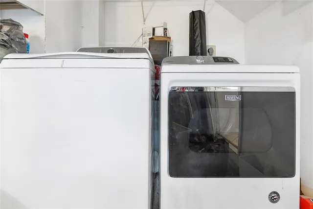 a close view of a sink and a stove in a kitchen