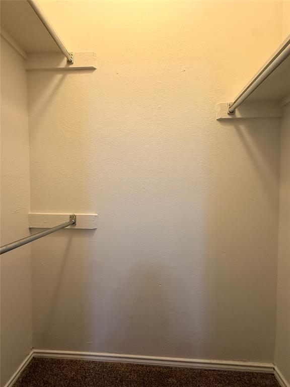 14277 Preston Road, Unit 512 Dallas, TX 75254 - Photo 7 of 8 a view of small space with racks on the wall