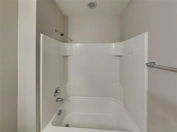a close view of a bathtub in bathroom