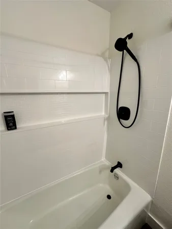 a bathroom with a bathtub