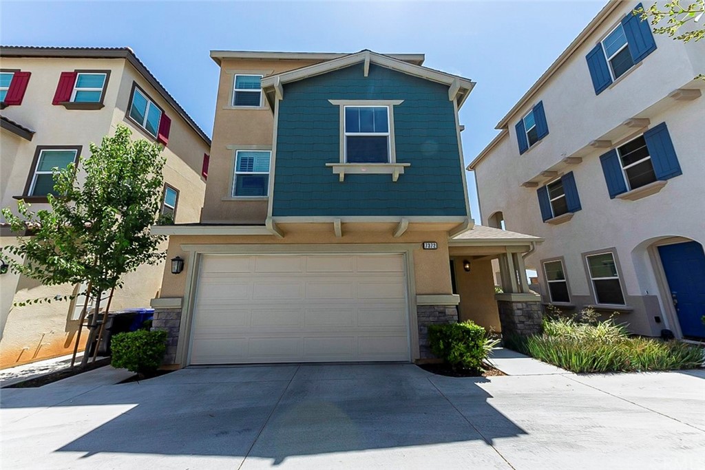 7372 Rocky Point Road Jurupa Valley, CA 92509 - Photo 1 of 1 a view of a house with a yard