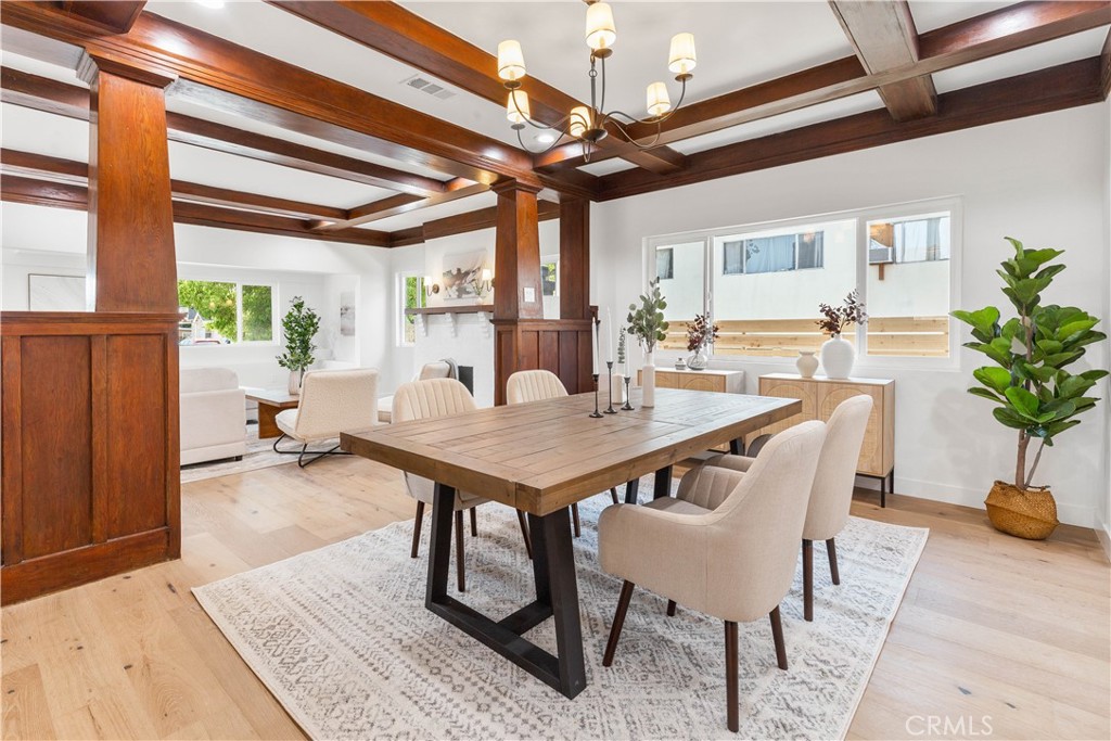 109 Painter Street Pasadena, CA 91103 - Photo 13 of 30 a view of a dining room with furniture window and wooden floor