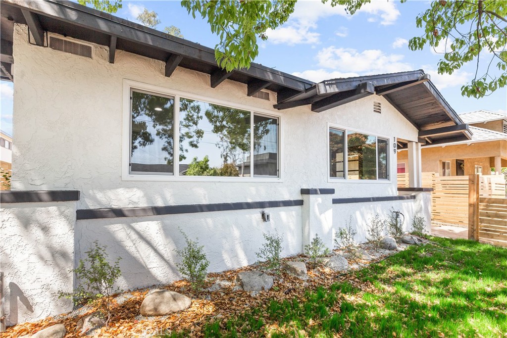 109 Painter Street Pasadena, CA 91103 - Photo 2 of 30 a front view of a house with a yard
