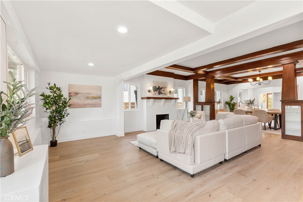 109 Painter Street Pasadena, CA 91103 - Photo 5 of 30 a living room with furniture and a chandelier