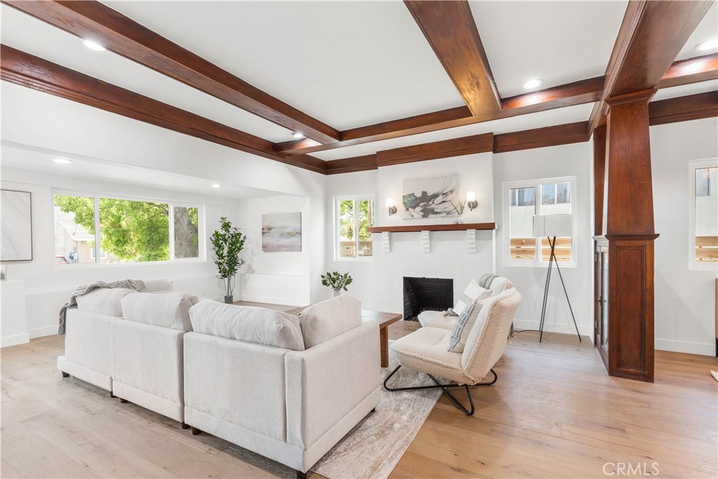 109 Painter Street Pasadena, CA 91103 - Photo 6 of 30 a living room with furniture and a fireplace