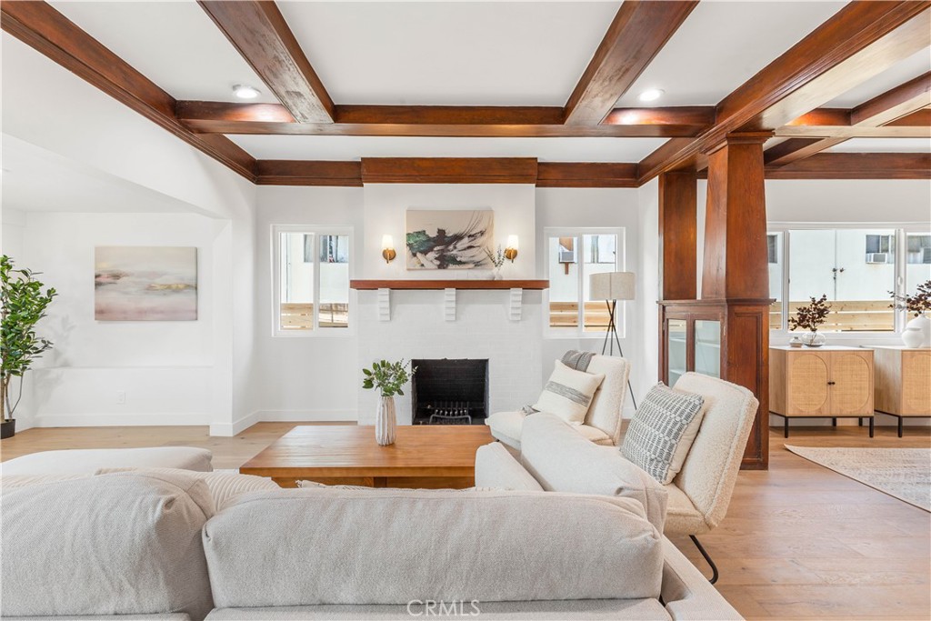 109 Painter Street Pasadena, CA 91103 - Photo 9 of 30 a living room with furniture and a fireplace