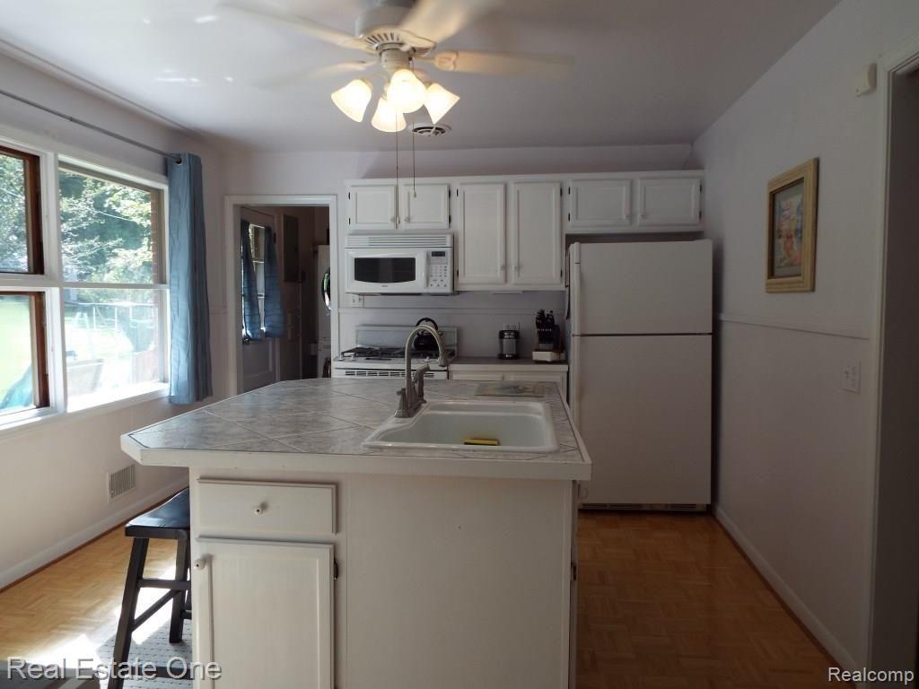 33265 Raphael Road Farmington, MI 48336 - Photo 6 of 37 white kitchen.JPG