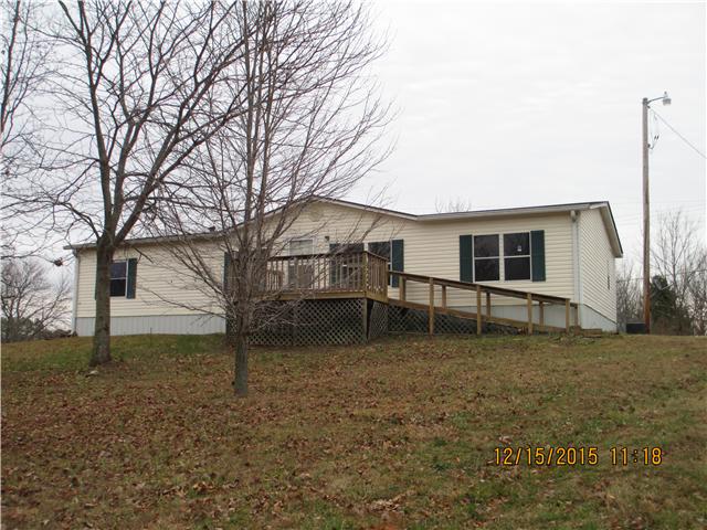 3145 Battle Creek Road Springfield, TN 37172 - Photo 1 of 12 a white house that has a tree in front of a house
