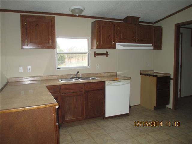3145 Battle Creek Road Springfield, TN 37172 - Photo 6 of 12 a kitchen with a sink cabinets and window