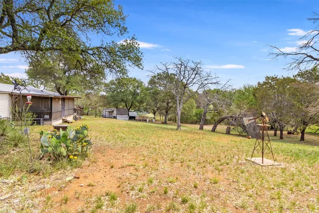 a view of yard covered with snow