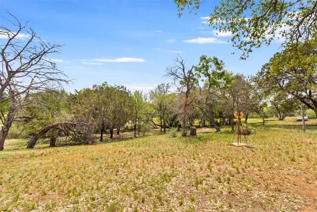 a view of a field with an outdoor space