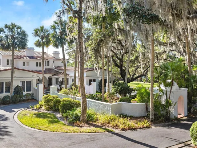 a kitchen with stainless steel appliances granite countertop a refrigerator sink and cabinets