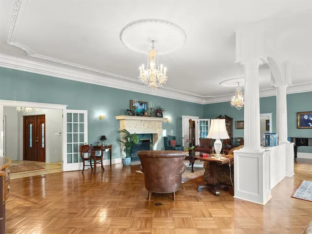 a view of a swimming pool with a yard