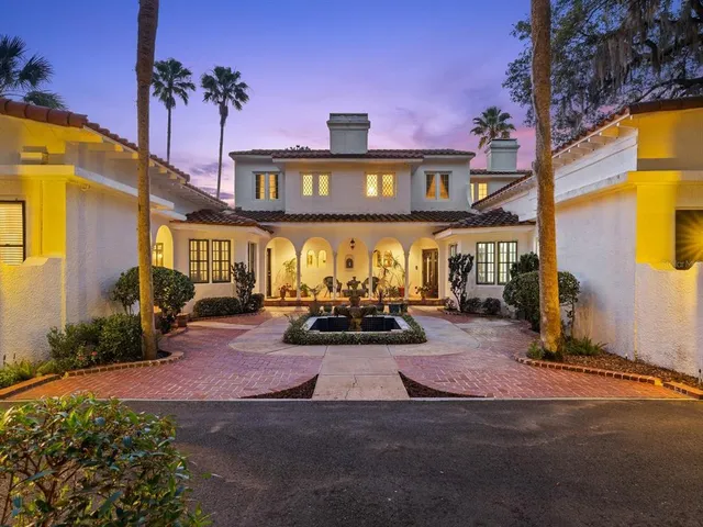 a view of a building with a garden